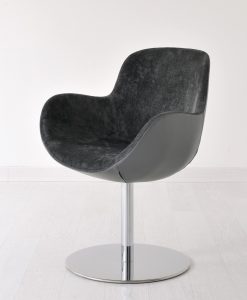 Swivel armchair with flat disk base. Chrome round metal base, velvet and leather covering. Design by Edi & Paolo Ciani. Luxurious furniture. Free shipment.