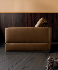 Brown leather armchair. Design Mauro Lipparini. High quality luxury furniture.