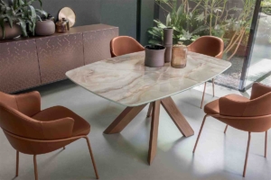 Contemporary designer table in an elegant dining room with balanced proportions