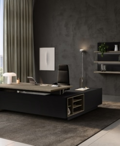 Elite desk in Pioppo Light with a black storage return and open compartments.