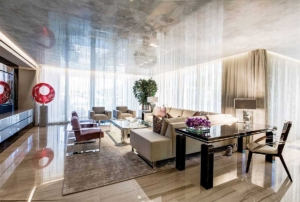 Luxury dining room with marble-effect table, elegant chairs and contemporary interior styling