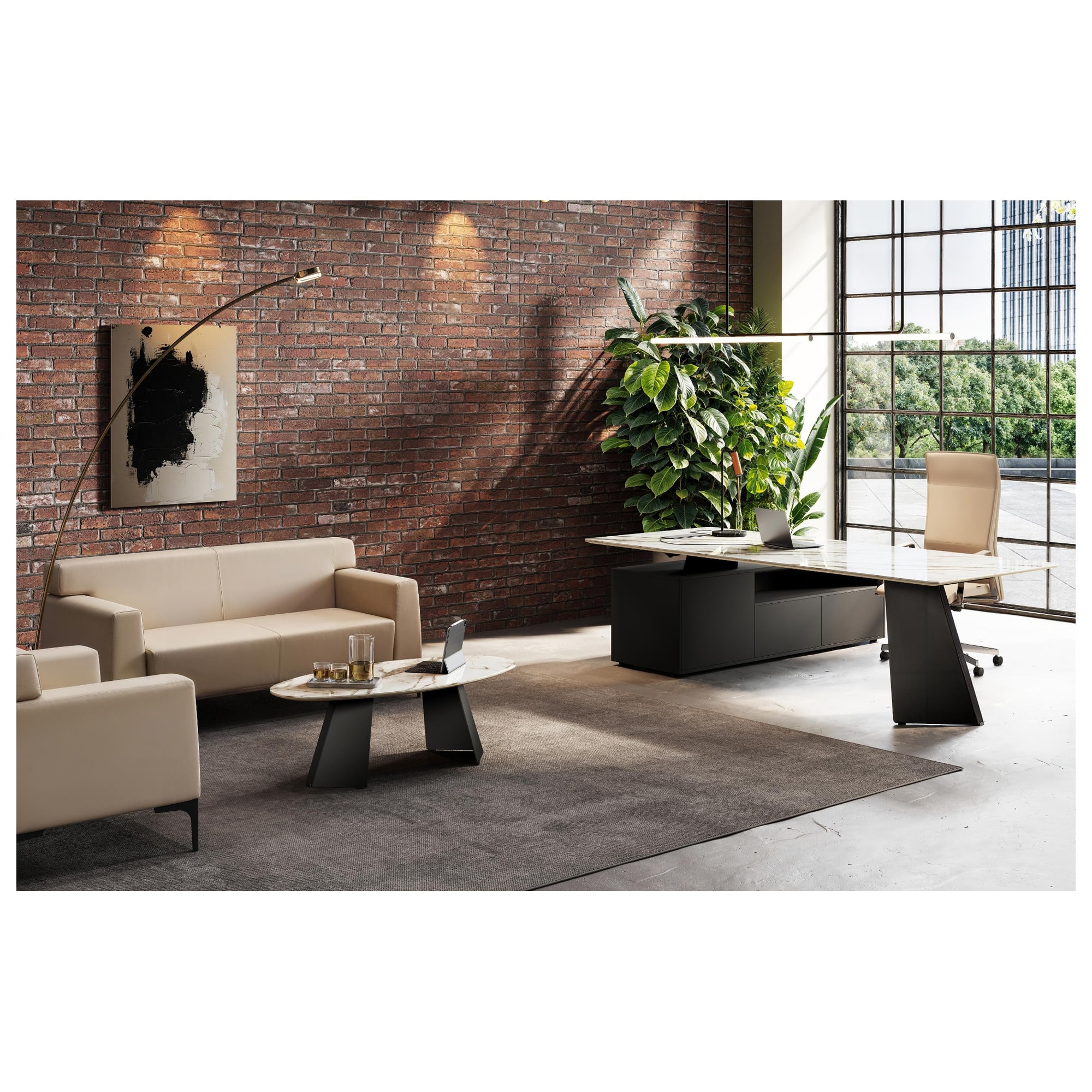 Office with a MONOLITH Calacatta Bianco desk, black side storage, light sofa and coordinating coffee table.