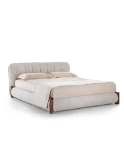 Nuage upholstered bed viewed in perspective from the left