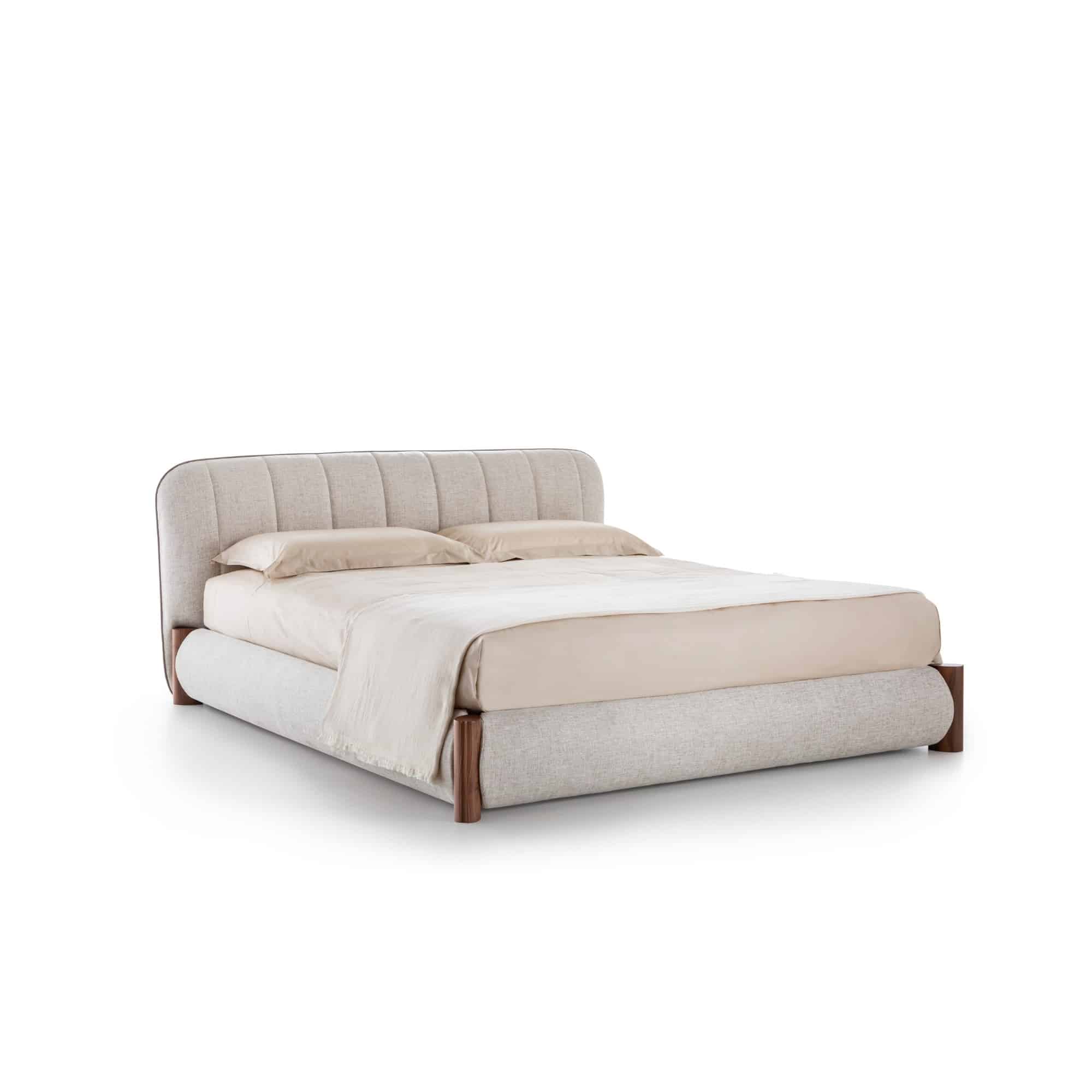 Nuage upholstered bed viewed in perspective from the left